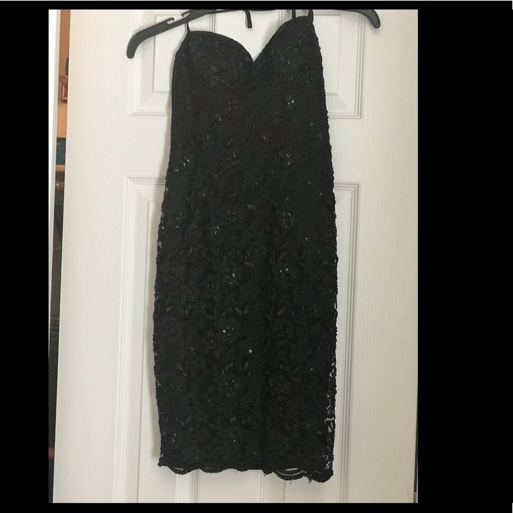 Black spaghetti strap beaded dress.